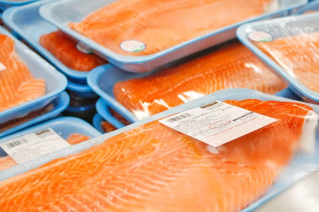 A close-up shot of individually packaged salmon filets from Costco.